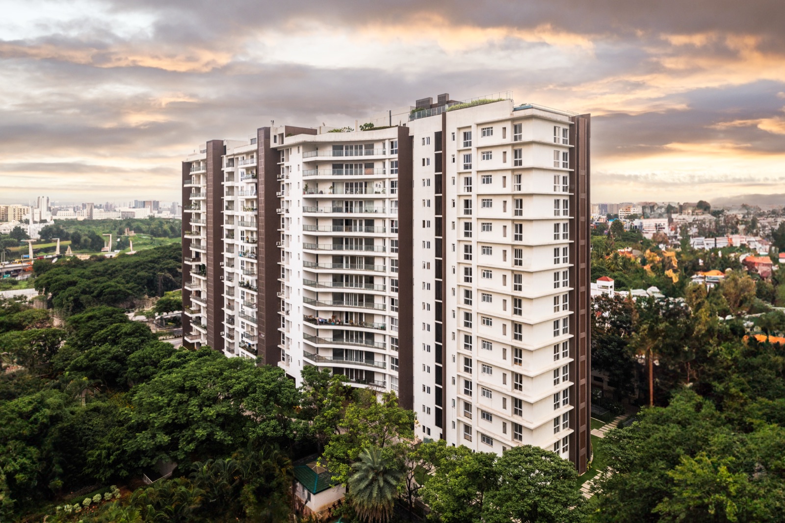 La Palazzo twin towers amidst lush greenery